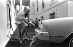 Susan Ford washes her car