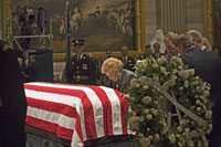 With her four children behind her Mrs. Ford pauses at the casket of her husband of forty-two years during funeral events for President Ford at the U.S. Capitol. January 1, 2007. 