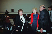 Congresswoman Mary Rose Oakar (D-OH) greets Betty Ford as she arrives to testify before the Select Committee on Aging Subcommittee on Health and Long-Term Care in support of public spending and insurance coverage for substance abuse treatment programs such as those offereed by the Betty Ford Center. March 25, 1991. 