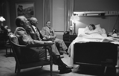 President Ford, Bob Hope and an unidentified man visit Mrs. Ford at the Bethesda Naval Hospital, Bethesda, MD, during her recovery from breast cancer surgery. 