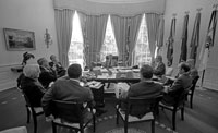 President Ford meets with his senior staff prior to the second press conference of his presidency.