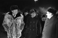 Just moments after this photo was taken, President Ford informally concluded the Vladivostok summit by giving his wolfskin coat to Secretary Brezhnev on the tarmac at Vozdvizhenka  Airport.  