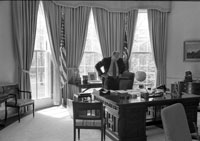 President Ford at his Oval Office desk.   March 25, 1975. 