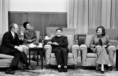 President and Mrs. Ford, Vice Premier Deng Xiao Ping, and Deng’s interpreter have a cordial chat during an informal meeting. 