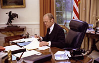 President Ford at work in the Oval Office. January 27, 1976.