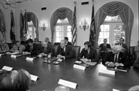 President Ford conducts a meeting to discuss a Federal initiative to immunize all Americans against the swine flu influenza.