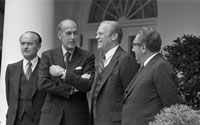 Prior to their Oval Office meeting President Ford and French President Valery Giscard d’Estaing stand on the White House Colonnade along with Secretary of State Henry Kissingerand French Foreign Minister Jean Sauvagnargues.   May 17, 1976.  