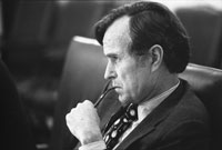 CIA Director George H.W. Bush listens intently at a National Security Council meeting following the assassinations in Beirut of U.S. Ambassador to Lebanon Francis E. Meloy, Jr. and Economic Counselor Robert O. Waring on June 16.  June 17, 1976.