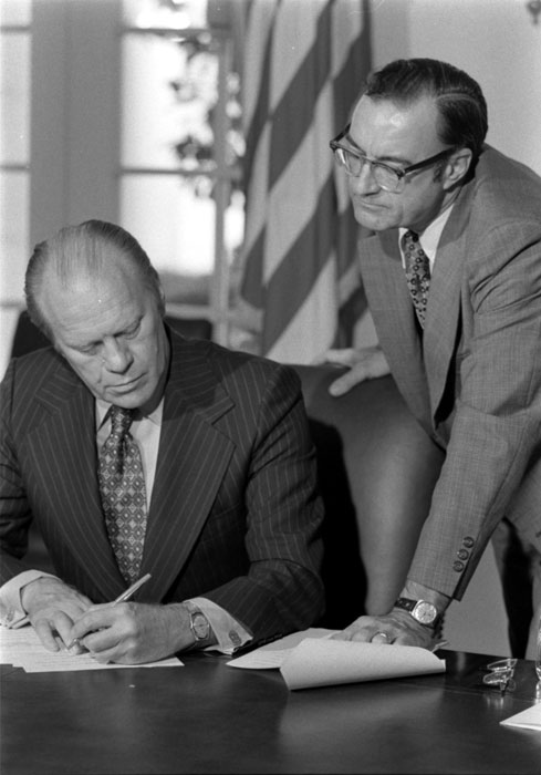 Bill Roberts assisting President Ford with preparations for his taped message to the Radio and Television News Directors conference, September 12, 1974 (A0739-14)