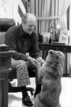 [President Gerald Ford in the Oval Office with his dog Liberty]