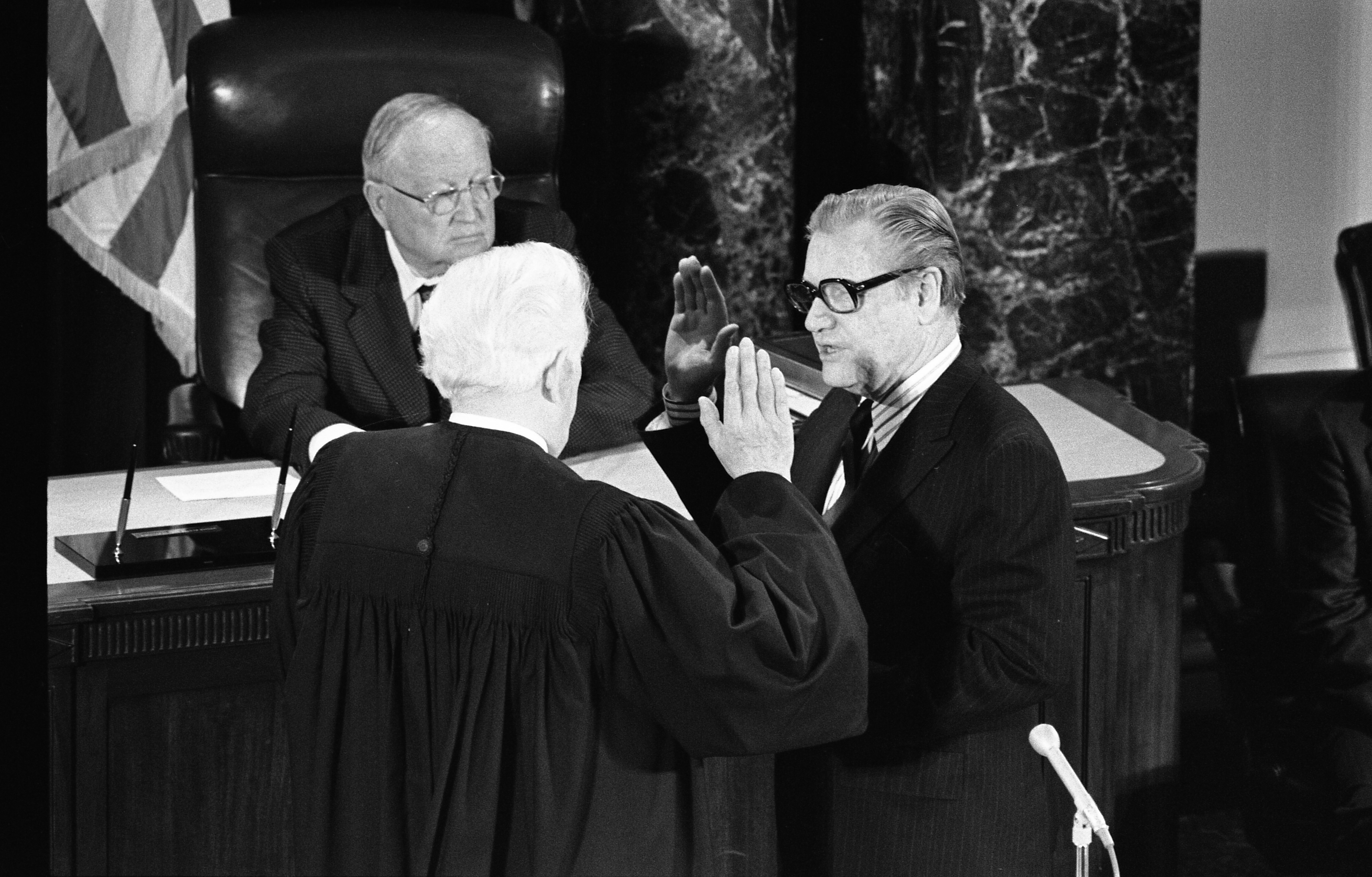 Nelson Rockefeller being sworn in by Chief Justice Burger.
