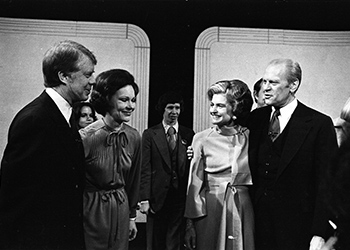 President Ford and Betty Ford greet Jimmy and Rosalyn Carter prior to the debate