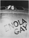 "Col. Paul W. Tibbets, Jr., pilot of the ENOLA GAY, the plane that dropped the atomic bomb on Hiroshima, waves from his cockpit before the takeoff, 6 August 1945.", 08/06/1945 