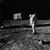 Photograph of Astronaut Edwin E. (Buzz) Aldrin, Jr. Posing on the Moon Next to the U.S. Flag , 07/20/1969 