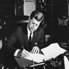 Photograph of President John F. Kennedy Signing the Proclamation for the Interdiction of the Delivery of Offensive Weapons to Cuba, 10/23/1962 