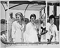 H0002-3. Betty Ford and three unidentified women aboard a naval launch at Pearl Harbor, HI. December 4, 1968.