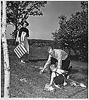 H0009-2. Betty Ford watches as Gerald R. Ford, Jr., plays with Michael Ford outside their apartment at 1521 Mount Eagle Place, Alexandria, VA. 1952.