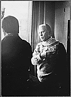 H0012-4. Representative Gerald R. Ford talking to an unidentified man. 1972.