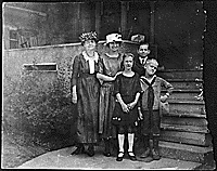 H0018-3. Gerald R. Ford, Jr. poses with his cousins Gardner James and Adele Elizabeth James; his aunt Tannisse Ayer James and another woman, possibly Adele Augusta Ayer Gardner.