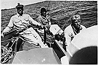 H0020-1. Gerald R. Ford, Jr. and two companions on a sailboat, probably on Lake Michigan near Ottawa Beach (site of his parent's summer cottage). 1940.