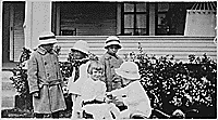 H0021-3. Gerald R. Ford, Jr. (then known as Leslie Lynch King, Jr.) plays in front of his house with his cousins Gardner and Adele James and two unidentified girls. 1915. 
