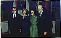 President and Mrs. Richard M. Nixon with Representative and Mrs. Gerald R. Ford in the Blue Room following the nomination of Gerald Ford as the President's choice to succeed Spiro T. Agnew as Vice President. 