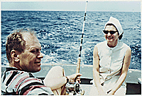 H0034-3. Gerald R. Ford and Betty Ford talk while Mr. Ford tries some deep-sea fishing during a vacation trip to Free Town, Eleutheria, Bahamas, with other Republican Congressmen and their wives. April 1966.