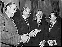 Vice President Gerald R. Ford jokes with Senate Minority Leader Hugh Scott (PA), Majority Leader Mike Mansfield (MT), and Senator Robert Griffin (MI).