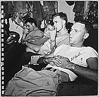 H0060-2. Crew members take a break aboard the USS MONTEREY. 1944.