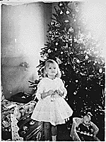 H0066-1. Susan Ford in front of the Christmas Tree in the Ford residence at 514 Crown View Drive, Alexandria, VA. December 1961.