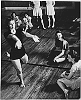 H0069-1. Betty Bloomer (front left) in a Bennington College Summer School of the Dance class taught by Martha Hill (right center). Bennington, Vermont. 1937.