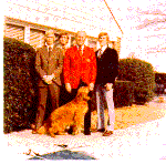 H0072-7. Gerald R. Ford poses with his sons Steve, Jack, and Mike and their golden retriever Brown Sugar in the back yard of the family residence at 514 Crown View Drive, Alexandria, VA. December 1972.