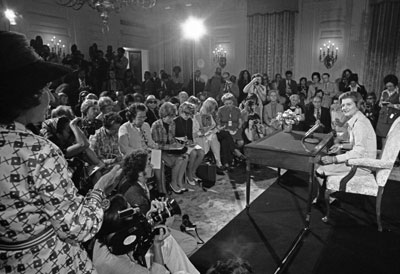 Betty Ford hosts her first press conference as First Lady in the White House State Dining Room.