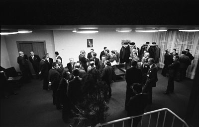 The American and Soviet delegations take a break for refreshments during a long nighttime meeting.  