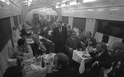 President Ford and his staff dine on a Soviet train enroute to Vozdvizhenka Airport, near Vladivostok, USSR.  