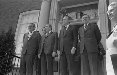 Henry Kissinger, Leonid Brezhnev, President Ford, and Andrei Gromyko outside the American Embassy.