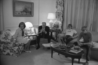 President Ford and First Lady Betty Ford  and their sons Jack and Steve watch the television news of  attempt on the President's life by Lynette "Squeaky" Fromme, in Sacramento, California in the White House residence. 
