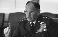 Chairman of the Joint Chiefs of Staff General George S. Brown makes a point at a National Security Council meeting following the assassinations in Beirut of  Ambassador Francis E. Meloy, Jr. and Economic Counselor Robert O. Waring on June 16.  June 17, 1976.  
