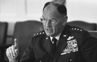 Chairman of the Joint Chiefs of Staff General George S. Brown makes a point at a National Security Council meeting following the assassinations in Beirut of Ambassador Francis E. Meloy, Jr. and Economic Counselor Robert O. Waring.