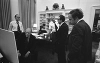 President Ford monitors the evacuation of American citizens from Beirut from the office of National Security Adviser Brent Scowcroft in the early morning hours of June 19.  Also present are [l-r] National Security Adviser Brent Scowcroft, Counsellor John Marsh, Deputy Assistant for National Security Affairs William G. Hyland and Chief of Staff Dick Cheney.  June 19, 1976.  