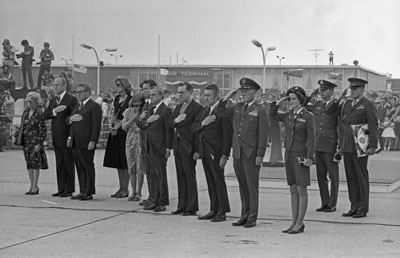 President Ford and Secretary of State Henry Kissinger join the Meloy and Waring families at Andrews Air Force Base for the arrival ceremony of the remains of U.S. Ambassador to Lebanon Francis E. Meloy, Jr. and Economic Counselor Robert O. Waring, who were assassinated by terrorists in Beirut on June 16.  Also present are L. Dean Brown, Special Emissary to Lebanon, and Secretary of the Senate Francis Valeo.  