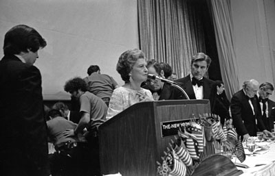 First Lady Betty Ford offers a prayer for Jewish National Fund president Rabbi Maurice Sage who collapsed onstage from a heart attack just before presenting her with a Bible at the Fund’s gala dinner to inaugurate the American Bicentennial National Park in Israel.   Despite efforts of Secret Service officers to revive Dr. Sage, he died shortly afterward. Hilton Hotel, New York.   June 22, 1976.