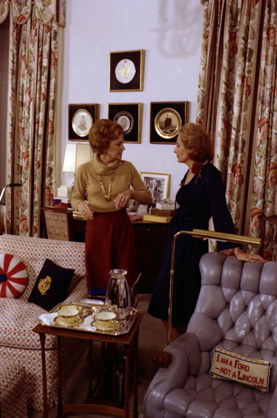 As part of a televised farewell interview with President and Mrs. Ford,  Mrs. Ford takes ABC correspondent Barbara Walters on a White House tour,  showing for the first time on television some of the occupied rooms on the third floor, such as the President’s private office shown here.   