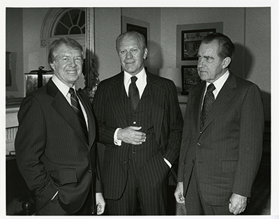 President Jimmy Carter, President Gerald Ford, and President Richard Nixon in Howard Baker's office after attending a memorial service for Hubert H. Humphrey in the Capitol Rotunda.