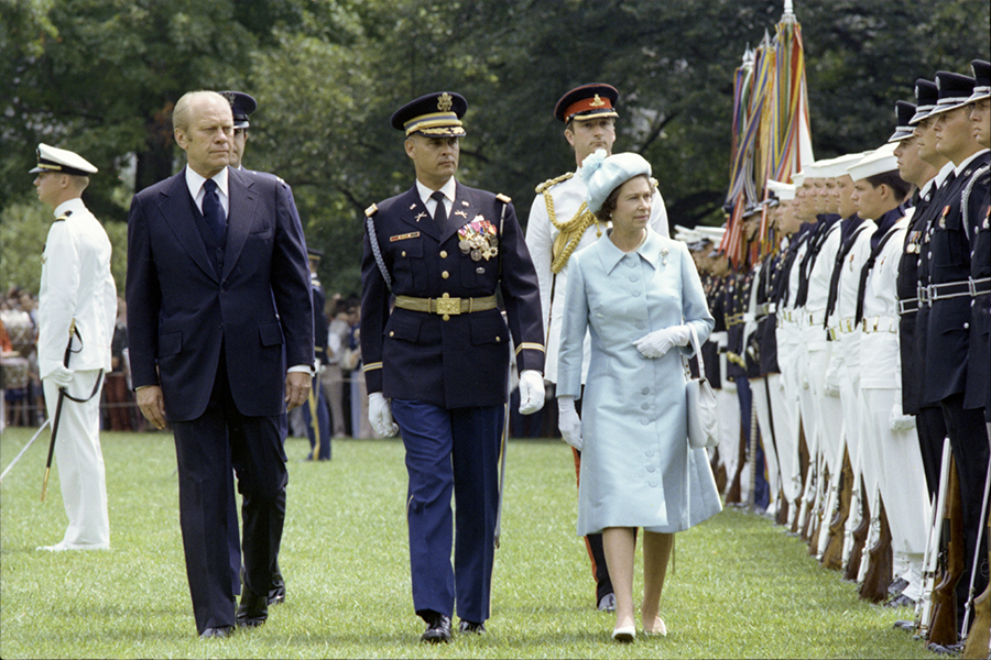 President Ford and Queen Elizabeth II reviewing the Honor Guard at the state arrival ceremony for the Queen on the South Lawn of the White House