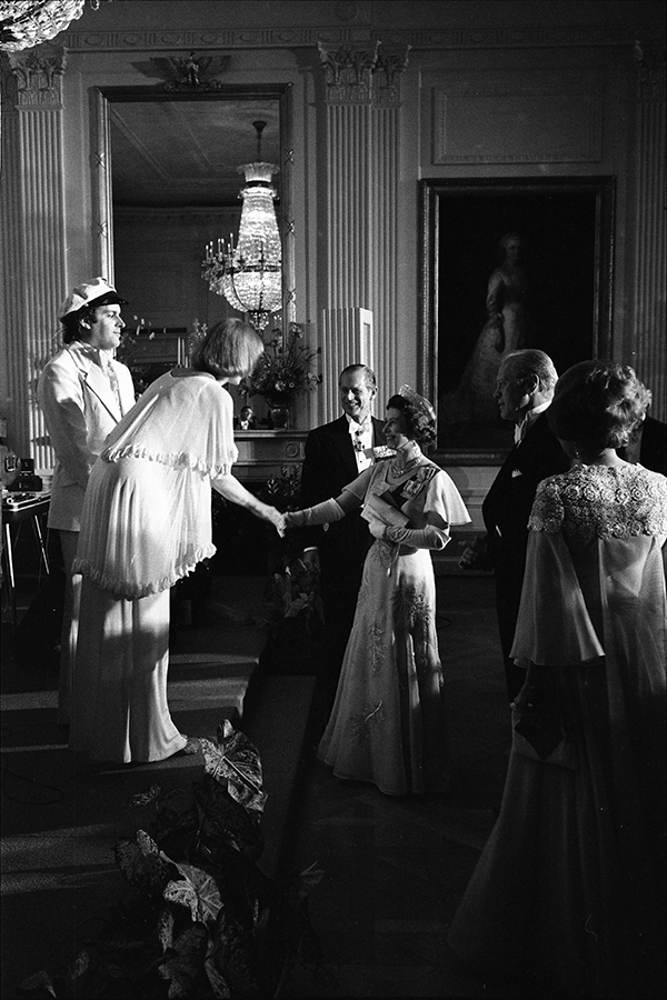 Queen Elizabeth II greets Toni Tennille of The Captain and Tennille following their performance in the East Room during a state dinner honoring Her Majesty.