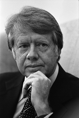 President-elect Jimmy Carter during a meeting with President Ford in the Oval Office.