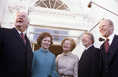 President Ford and Betty Ford greeting President-elect Jimmy Carter, Rosalynn Carter, and Speaker of the House Thomas P. Tip O'Neill at the North Portico of the White House prior to a reception for the Carters and the Mondales.
