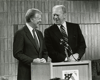 Former Presidents Jimmy Carter and Gerald R. Ford co-host an All-Democracies Conference at the Gerald R. Ford Library in Ann Arbor, Michigan.