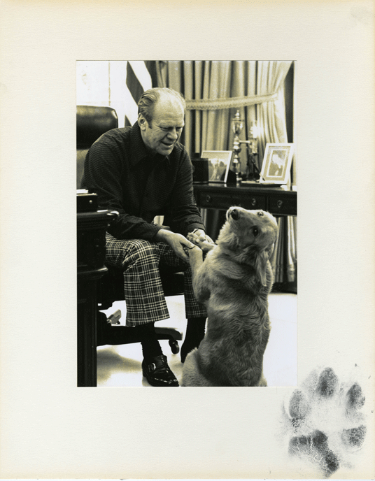 President Gerald R. Ford and his dog Liberty in the Oval Office